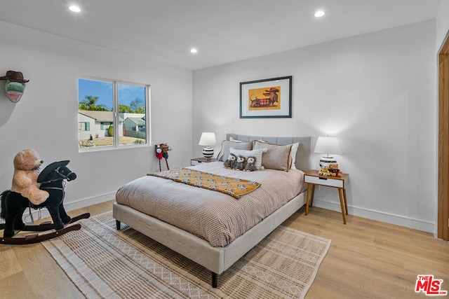 bedroom featuring light hardwood / wood-style flooring