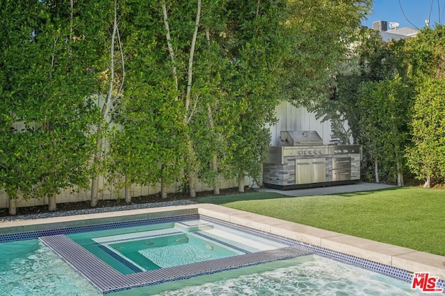 view of swimming pool featuring an in ground hot tub, a yard, and area for grilling