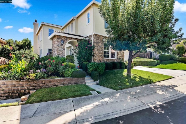 view of front of house featuring a front yard