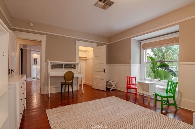 sitting room featuring dark hardwood / wood-style flooring