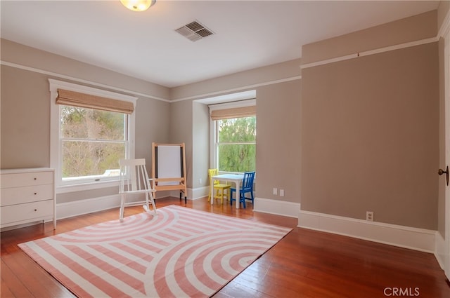 living area with wood-type flooring