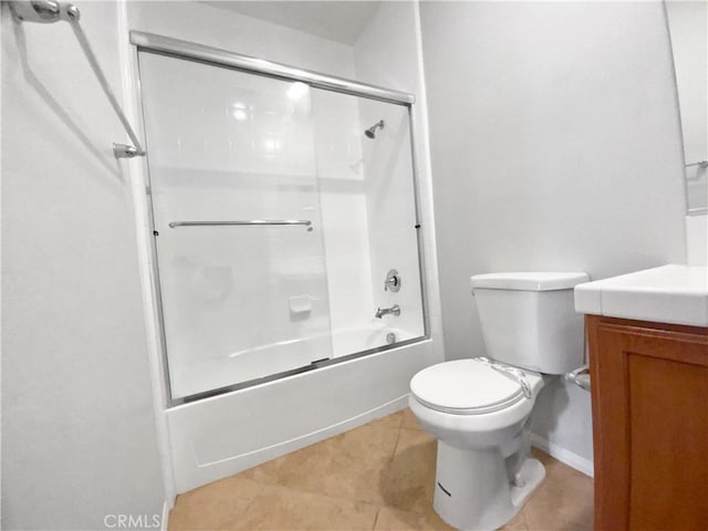 full bathroom with toilet, vanity, tile patterned flooring, and shower / bath combination with glass door