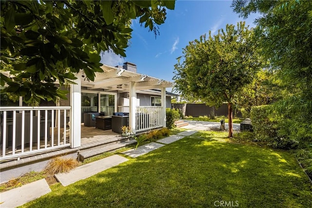 view of yard featuring a pergola and a patio