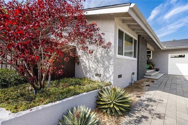 view of home's exterior with a garage