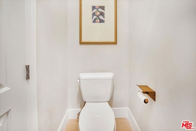 bathroom featuring toilet