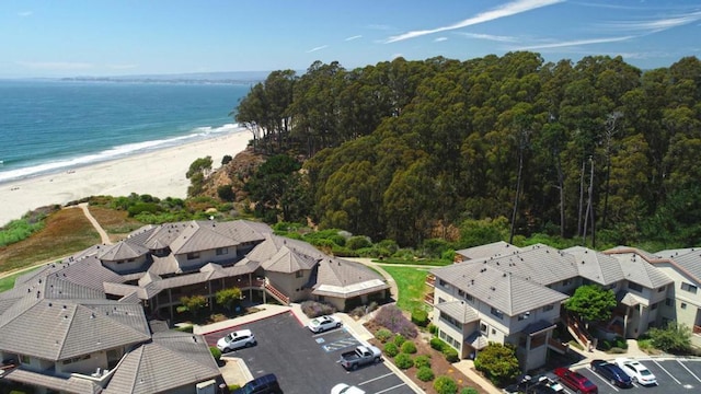 aerial view featuring a view of the beach and a water view