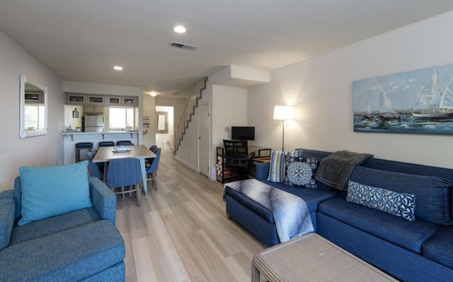 living room featuring light wood-type flooring