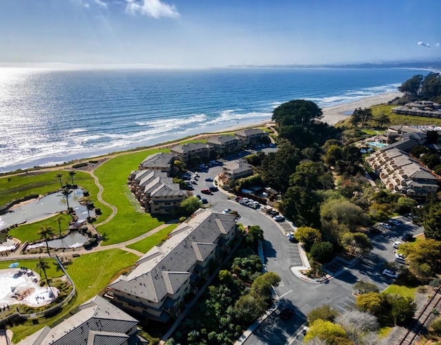 drone / aerial view with a view of the beach and a water view