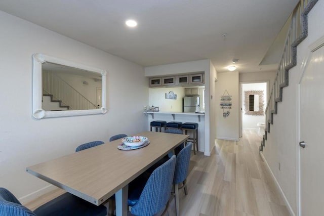 dining room featuring light hardwood / wood-style floors