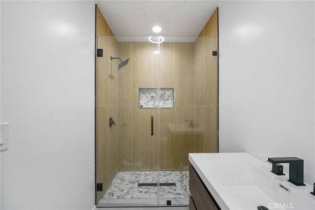 bathroom featuring vanity and walk in shower