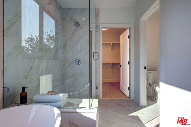 bathroom featuring toilet and plus walk in shower