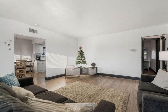 living room featuring light wood-type flooring