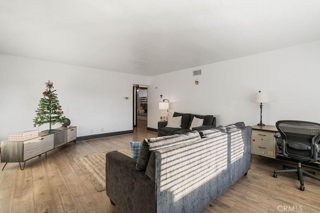 living room with hardwood / wood-style floors