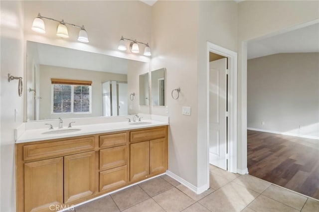 bathroom with vanity and tile patterned floors