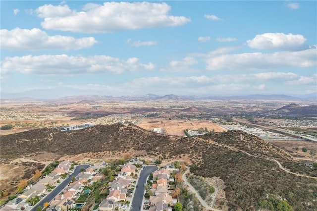 drone / aerial view featuring a mountain view