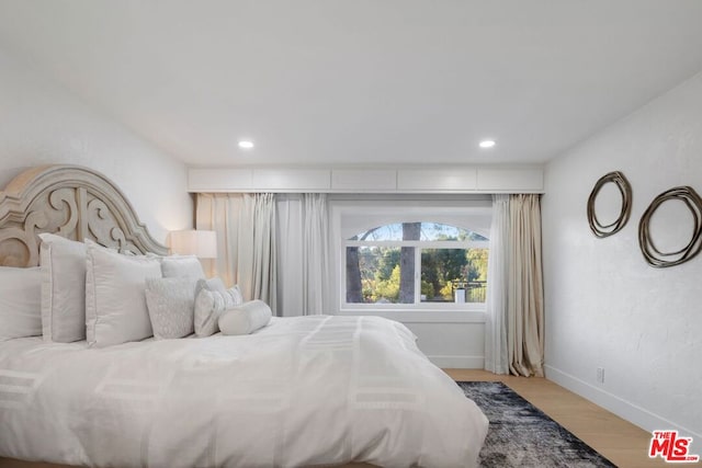 bedroom featuring light hardwood / wood-style flooring