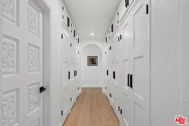 hallway featuring light hardwood / wood-style floors