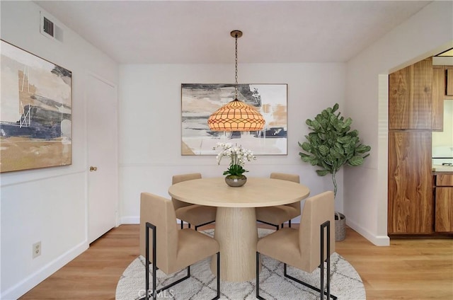 dining area featuring light hardwood / wood-style flooring