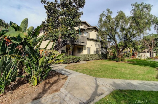 view of community featuring a lawn