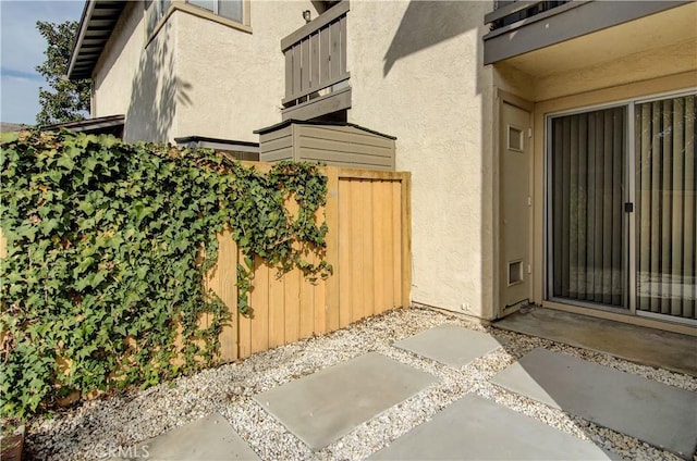 doorway to property featuring a balcony