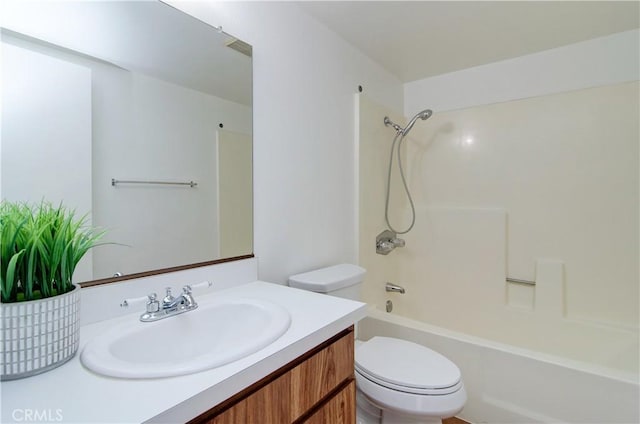 full bathroom featuring toilet, bathtub / shower combination, and vanity