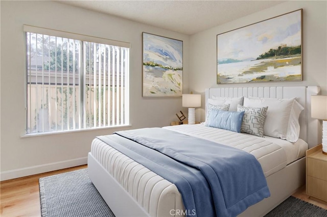 bedroom featuring light hardwood / wood-style floors