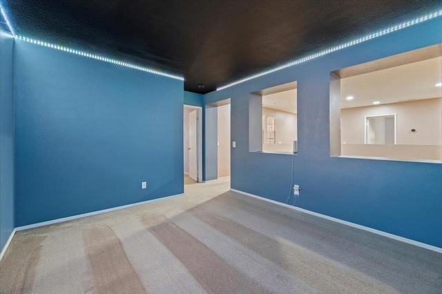 empty room with carpet floors