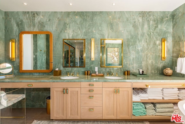 bathroom featuring tile patterned floors and vanity