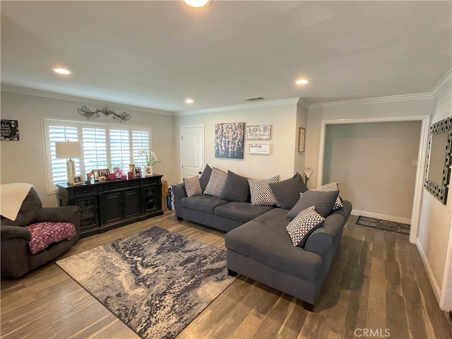 living room with ornamental molding and wood-type flooring