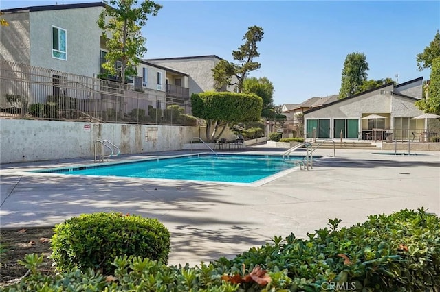 view of pool featuring a patio area