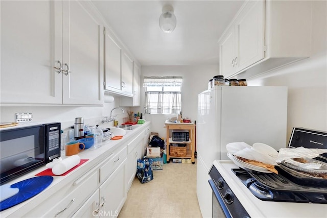 kitchen with sink and white cabinets