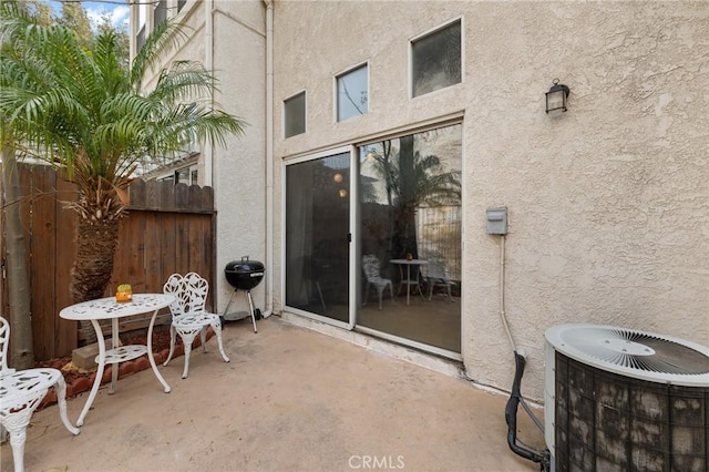 view of patio / terrace with grilling area and central AC