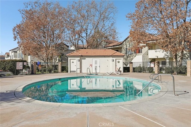 view of pool featuring a patio