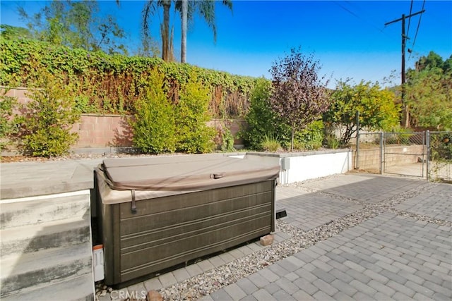 view of patio featuring a hot tub