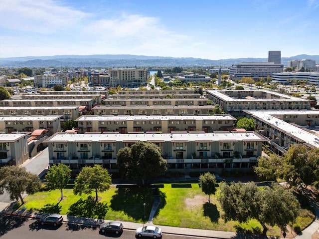 birds eye view of property featuring a mountain view