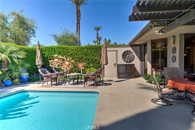 view of pool featuring a pergola and a patio area