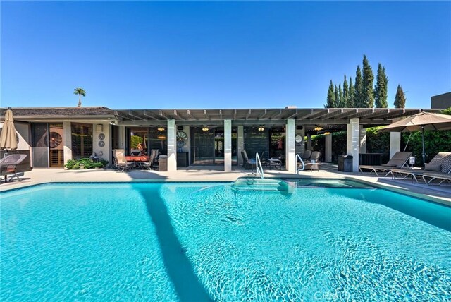 view of pool featuring a patio area