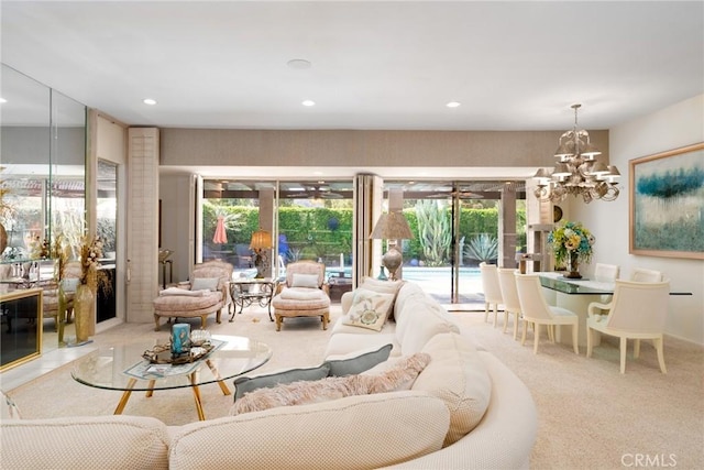 carpeted living room with a notable chandelier