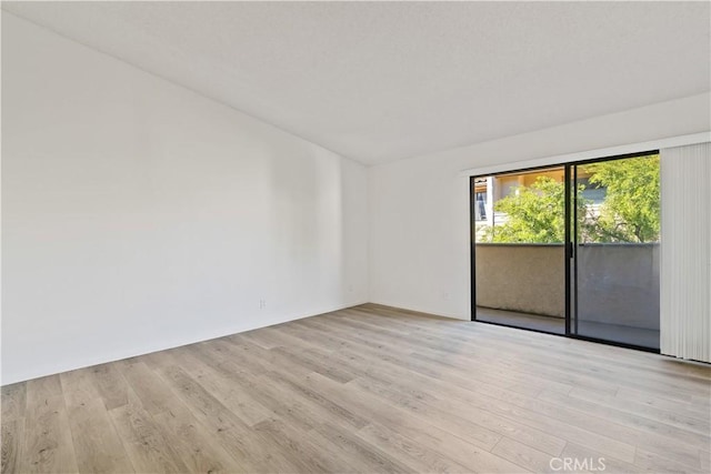 unfurnished room featuring light wood-type flooring