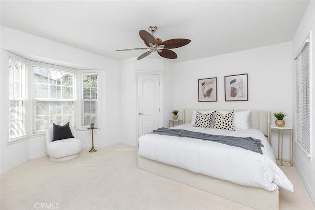 bedroom featuring ceiling fan and carpet flooring