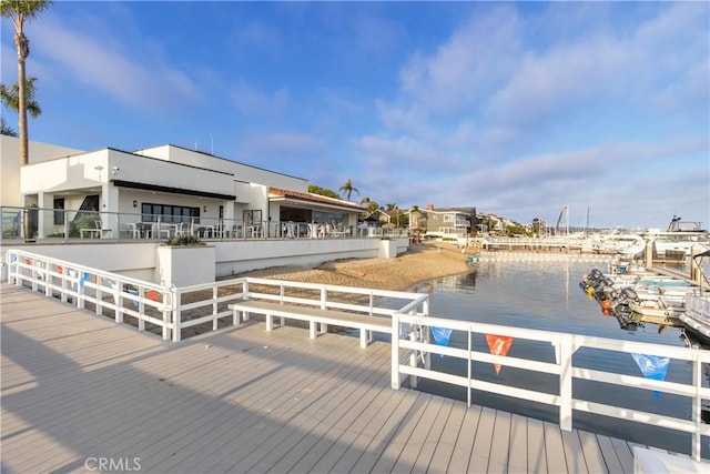 dock area with a water view