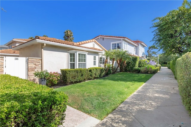 view of front of home with a front yard