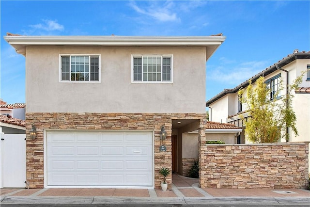 view of front of home with a garage