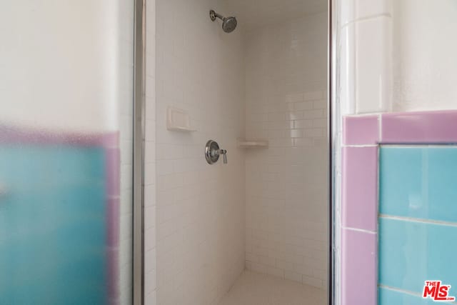 bathroom with an enclosed shower