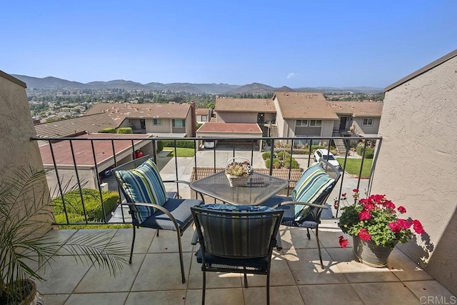 balcony featuring a mountain view