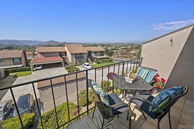 balcony featuring a mountain view