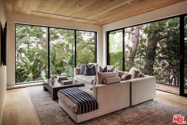 sunroom / solarium with wooden ceiling