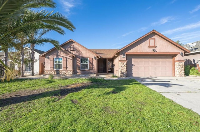 view of front of property featuring a front yard and a garage