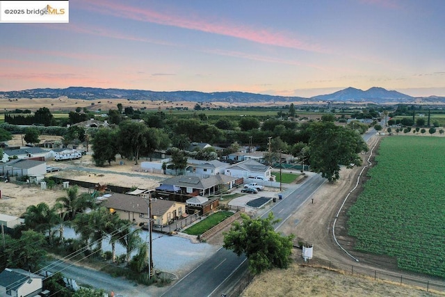 aerial view at dusk with a mountain view