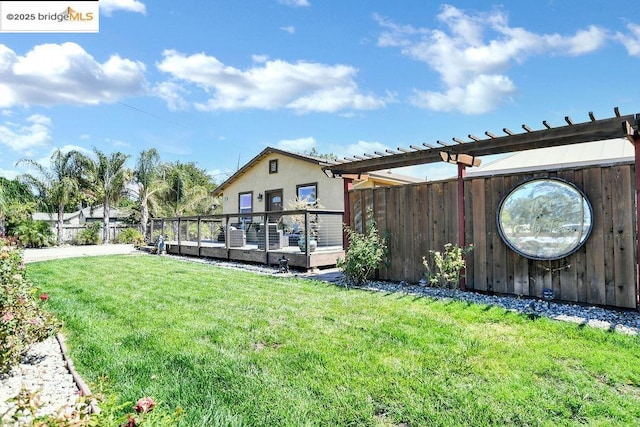 view of yard featuring a wooden deck